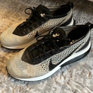 Worn for just a few hours size 7 Nikes cream black with a hint of pastel colors